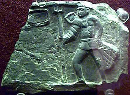 Chestertourist.com - The Chester Gladiator. This small slate plaque was found in 1736 in Fleshmonger's Lane (Now Newgate Street) in Chester.